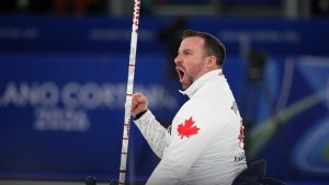 Jon Thurston, of Canada, reacts during the wheelchair curling mixed team gold medal game versus China at the 2026 Winter Paralympics, in Cortina d'Ampezzo, Italy, Saturday, March 14, 2026. (Emilio Morenatti/AP)
