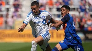 CF Montréal midfielder Iván Jaime, left, dribbles on goal as FC Cincinnati forward Ender Echenique, right, defends during the first half of an MLS soccer match, Sunday, March 22, 2026, in Cincinnati. (Kareem Elgazzar/AP)