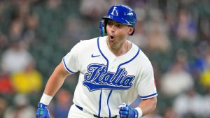 Italy's Dominic Canzone celebrates after hitting a three-run home run against Brazil during the seventh inning of a World Baseball Classic game, Saturday, March 7, 2026, in Houston. (David J. Phillip/AP)