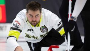 Matt Dunstone, skip of Team Manitoba-Dunstone releases his stone during the 1 vs. 2 playoffs at the Montana's Brier Canadian men's curling championship, in St. John's, N.L. (Paul Daly/THE CANADIAN PRESS)
