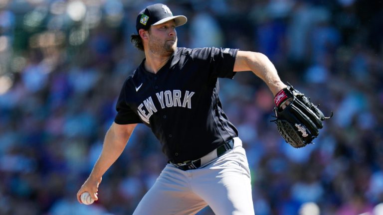New York Yankees starting pitcher Gerrit Cole throws against the Chicago Cubs during the first inning of a spring training baseball game, Tuesday, March 24, 2026, in Mesa, Ariz. (Ross D. Franklin/AP)