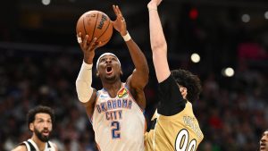Oklahoma City Thunder guard Shai Gilgeous-Alexander (2) goes to the basket against Washington Wizards forward Tristan Vukcevic (00) during the first half of an NBA basketball game, Saturday, March 21, 2026, in Washington. (Nick Wass/AP)