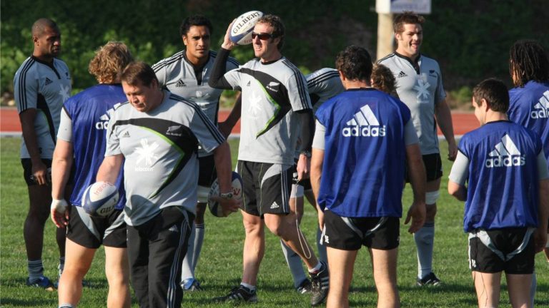 New Zealand rugby union physical trainer Nic Gill, center with the ball, directs New Zealand players during a training session in Marseille, southern France, Thursday, Nov. 26, 2009. New Zealand are due to play France at the Velodrome Stadium, in Marseille, in an international rugby union match on Saturday. (Claude Paris/AP)