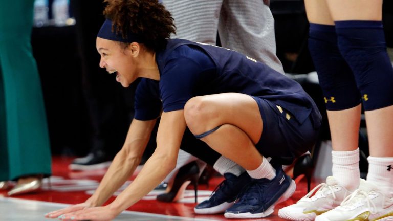 Notre Dame guard Hannah Hidalgo celebrates on the bench as the final seconds run off the clock as they defeat Ohio State in the second round of the NCAA college basketball tournament, Monday, March 23, 2026, in Columbus, Ohio. (Tom E. Puskar/AP Photo)