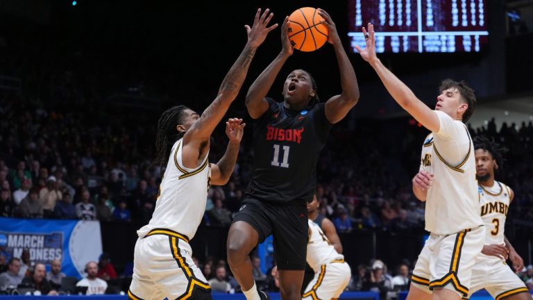 Howard guard Ose Okojie (11), center, shoots during the second half in a First Four college basketball game in the NCAA Tournament against UMBC, Tuesday, March 17, 2026, in Dayton, Ohio. (Kareem Elgazzar/AP Photo)