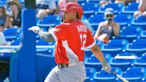 Canada's Josh Naylor (12) lines into a double play during the third inning of an exhibition baseball game against the Toronto Blue Jays Tuesday, March 3, 2026, in Dunedin, Fla. (Chris O'Meara/AP)