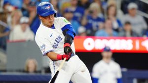 Toronto Blue Jays' Kazuma Okamoto (7) swings at a pitch against the Athletics during second inning MLB baseball action in Toronto on Friday, March 27, 2026. (Frank Gunn/CP)