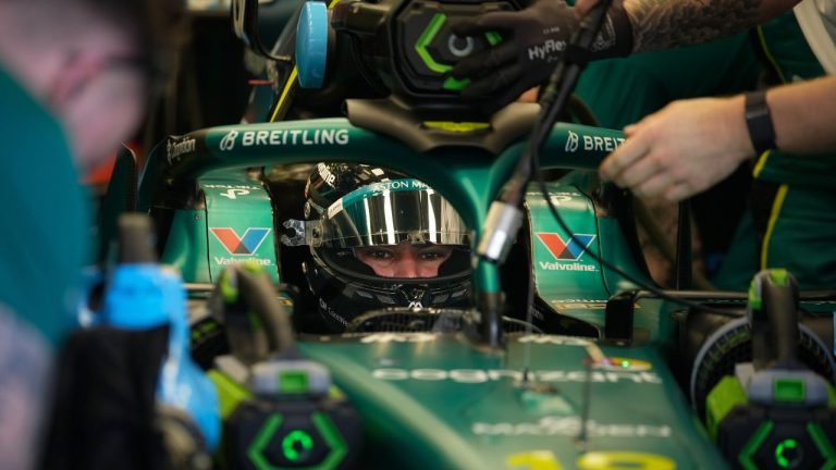 Aston Martin driver Lance Stroll of Canada waits in his car on the third day of Formula One pre-season test at the Bahrain International Circuit in Sakhir, Bahrain, Friday, Feb. 13, 2026. (Altaf Qadri/AP)