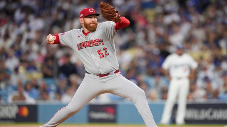 Cincinnati Reds starting pitcher Zack Littell throws to a Los Angeles Dodgers batter during the second inning in Game 2 of the National League Wild Card baseball playoff series Wednesday, Oct. 1, 2025, in Los Angeles. (Mark J. Terrill/AP)