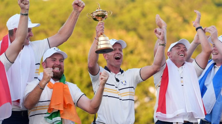 Europe captain Luke Donald poses with the trophy after winning the Ryder Cup golf tournament against the United States on the Bethpage Black golf course, Sunday, Sept. 28, 2025, in Farmingdale, N.Y. (Lindsey Wasson/AP)