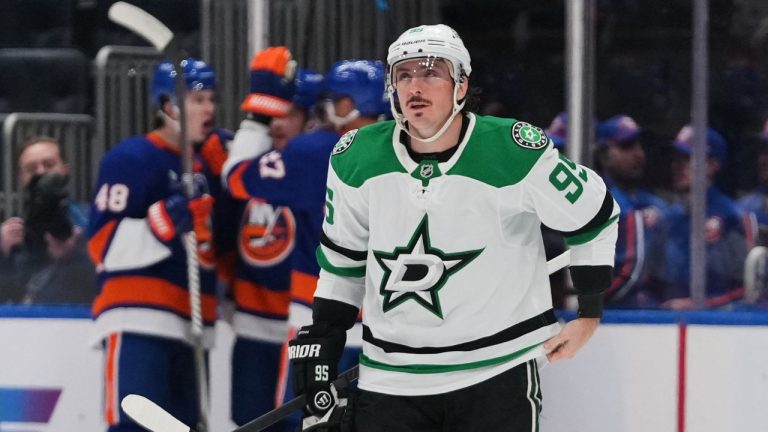 Dallas Stars' Matt Duchene (95) reacts as the New York Islanders celebrate a goal by Bo Horvat during the first period of an NHL hockey game Thursday, March 26, 2026, in Elmont, N.Y. (Frank Franklin II/AP)