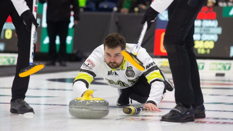 Team Manitoba Skip, Matthew Dunstone releases a stone during Draw 2 at the 2026 Brier in John's NL on Saturday Feb. 28, 2026. (Paul Daly/CP)