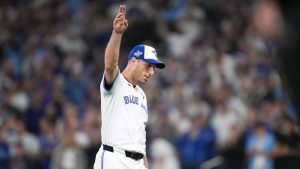 Toronto Blue Jays pitcher Max Scherzer (31) waves to the crowd as he leaves the game after being pulled during fifth inning Game 7 World Series playoff MLB baseball action against the Los Angeles Dodgers in Toronto on Saturday, Nov. 1, 2025. (Nathan Denette/CP)
