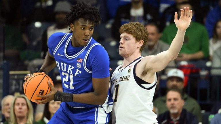 Notre Dame forward Ryder Frost (7) defends against Duke center Patrick Ngongba (21) during the first half of an NCAA basketball game, Tuesday, Feb. 24, 2026, in South Bend, Ind. (Marc Lebryk/AP)