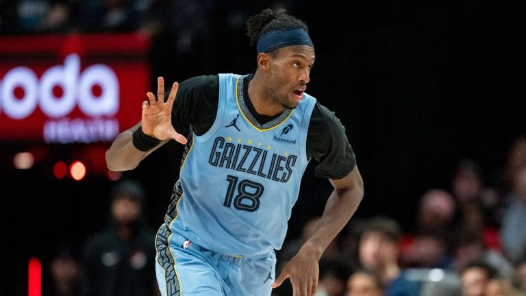 Memphis Grizzlies forward Olivier-Maxence Prosper (18) reacts after making a three point basket during the second half of an NBA basketball game against the Portland Trail Blazers on Saturday, Feb. 7, 2026, in Portland, Ore. (Ali Gradischer/AP)
