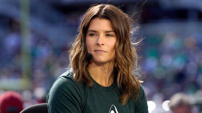Danica Patrick sits on the set of ESPN's College Game Day program as a guest picker in Soldier Field before an NCAA college football game between Wisconsin and Notre Dame, Sept. 25, 2021, in Chicago. (Charles Rex Arbogast/AP)