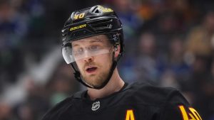 Vancouver Canucks' Elias Pettersson (40) prepares to take a faceoff during the first period of an NHL hockey game against the Dallas Stars, in Vancouver, on Monday, March 2, 2026. (Darryl Dyck/CP)