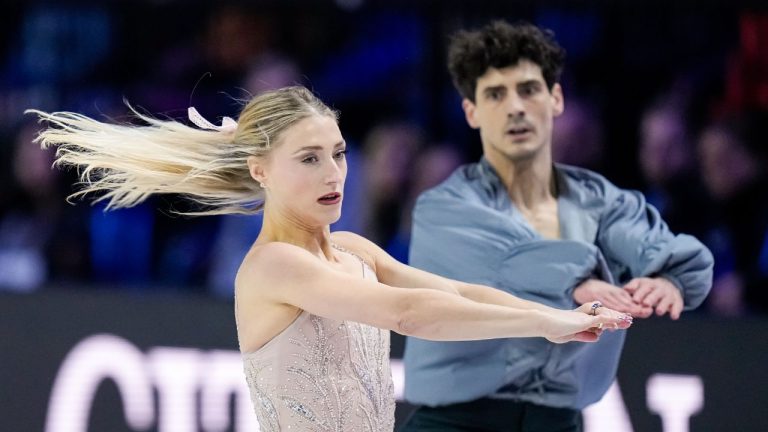 Piper Gilles and Paul Poirier from Canada compete during the ice dance free dance at the world figure skating championships in Prague, Czech Republic, Saturday, March 28, 2026. (Petr David Josek/AP Photo)