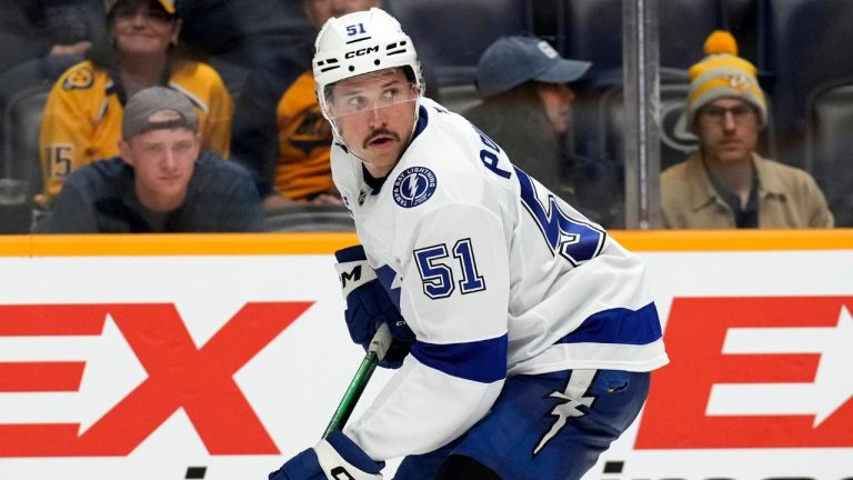 Tampa Bay Lightning's Derrick Pouliot plays against the Nashville Predators during the second period of a preseason NHL hockey game Saturday, Sept. 28, 2024, in Nashville, Tenn. (Mark Humphrey/AP)