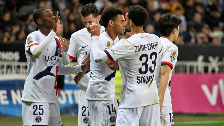 PSG's Nuno Mendes, left, celebrates after scoring the opening goal during the French League One soccer match between Nice and Paris Saint-Germain in Nice, France, Saturday, March 21, 2026. (Philippe Magoni/AP)