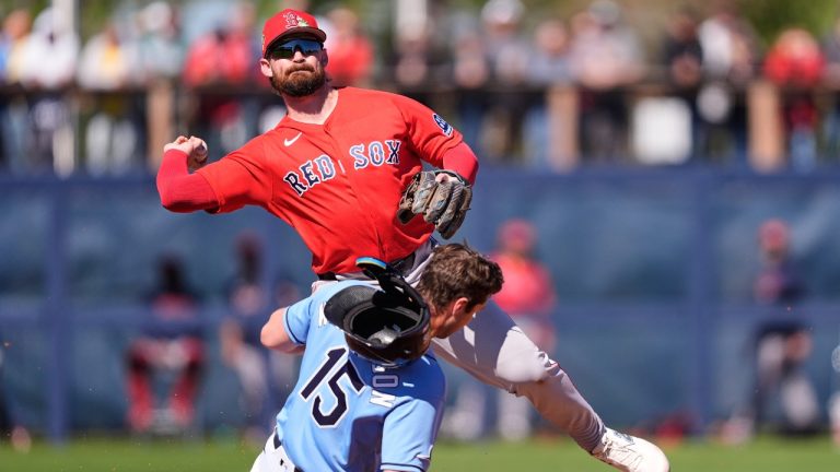 Tampa Bay Rays Ben Williamson is forced out at second as Boston Red Sox second baseman Brendan Rodgers throws to first on a double play in the fifth inning of a spring training baseball game in Port Charlotte, Fla., Monday, Feb. 23, 2026. (AP/Gerald Herbert)