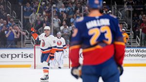 New York Islanders' Brayden Schenn (10) is honored during a time out during the first period of an NHL hockey game against the St. Louis Blues Tuesday, March 10, 2026, in St. Louis. (Jeff Roberson/AP)