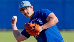 Toronto Blue Jays' Davis Schneider makes a throw at Spring Training in Dunedin, Fla., on Tuesday, Feb. 17, 2026. (Frank Gunn/THE CANADIAN PRESS)