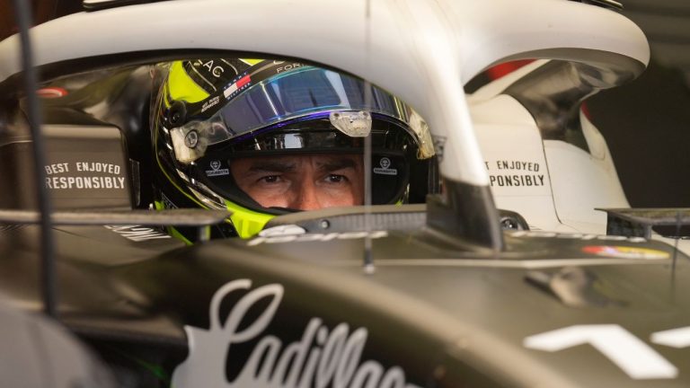 Cadillac driver Sergio Perez of Mexico waits in his car during a Formula One pre-season test at the Bahrain International Circuit in Sakhir, Bahrain, Wednesday, Feb. 11, 2026. (Altaf Qadri/AP)