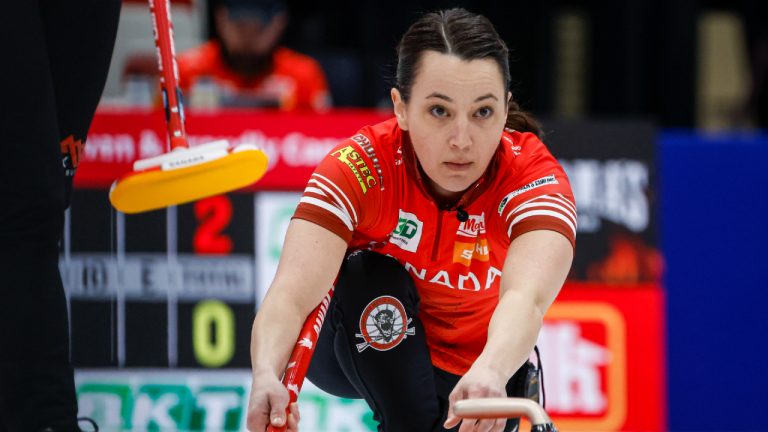 Team Canada third Val Sweeting delivers a stone against Denmark at the World Women’s Curling Championship in Calgary, Monday, March 16, 2026. (Jeff McIntosh/CP)