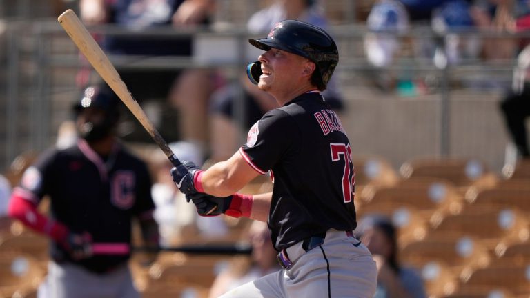 Cleveland Guardians' Travis Bazzana hits a three run home run in the second inning during spring training baseball game against the Los Angeles Dodgers, Tuesday, Feb. 24, 2026, in Phoenix. (Brynn Anderson/AP)