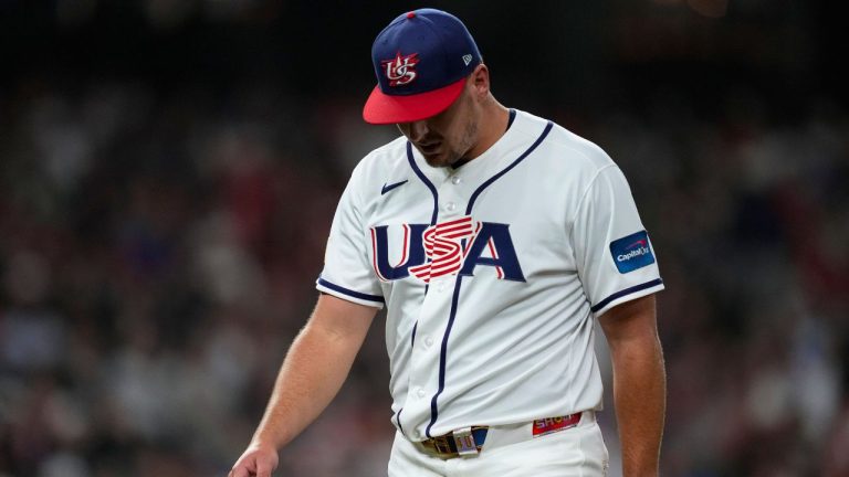 United States pitcher Brad Keller (40) walks to the dugout in the middle of the sixth inning of a World Baseball Classic game against Italy , Tuesday, March 10, 2026, in Houston. (Ashley Landis/AP Photo)