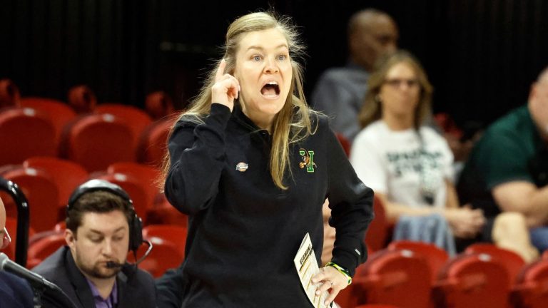 Vermont head coach Alisa Kresge coaches from the sideline against the NC State during the first half of the first round of the NCAA Women's Tournament. in Raleigh, N.C., Saturday, March 22, 2025. (Karl DeBlaker/AP Photo)