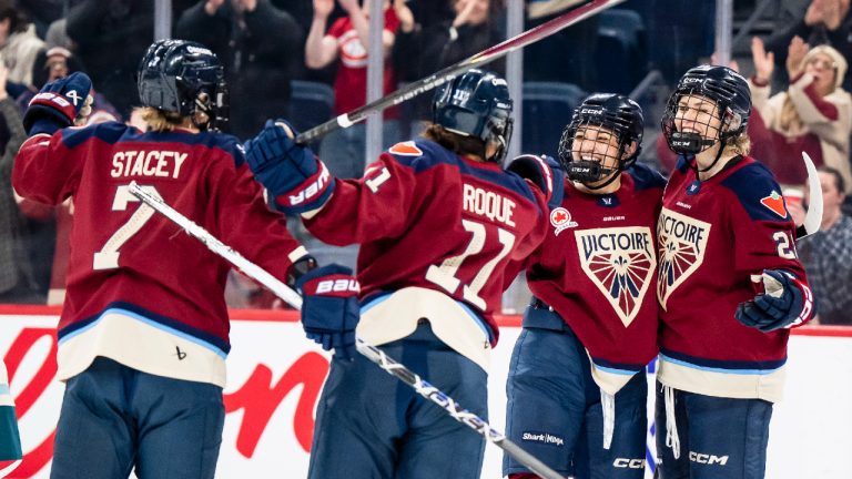 Montreal Victoire's Catherine Dubois (28), far right, celebrates with teammates after scoring during second period PWHL hockey action against Seattle Torrent in Laval, Que., on Thursday, March 19, 2026. (Christopher Katsarov/CP)