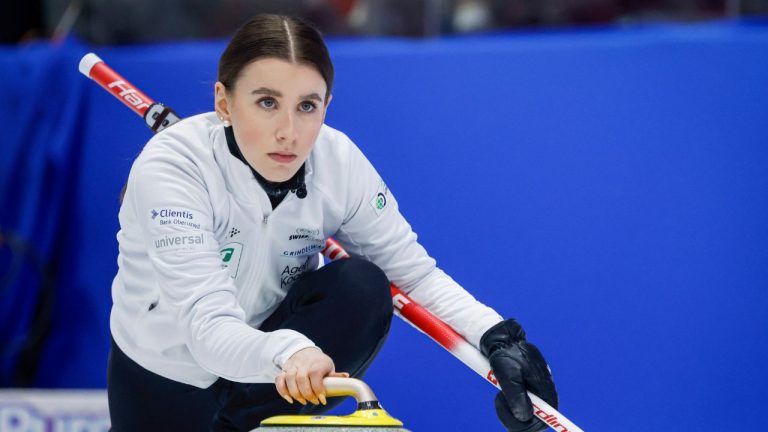 Switzerland skip Xenia Schwaller makes a shot against Japan at the World Women's Curling Championship in Calgary, Saturday, March 14, 2026. (Jeff McIntosh/CP)