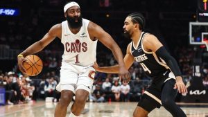 Cleveland Cavaliers guard James Harden (1) dribbles against Atlanta Hawks guard Gabe Vincent (4) during the first half of an NBA basketball game, Friday, April 10, 2026, in Atlanta. (Colin Hubbard/AP)