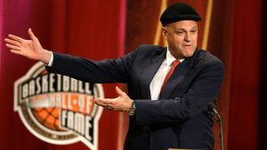 Inductee Oscar Schmidt, of Brazil, speaks during the enshrinement ceremony for this year's class of the Basketball Hall of Fame, at Symphony Hall in Springfield, Mass., Sept. 8, 2013. Schmidt, whom his Brazil compatriots know as the “Holy Hand,” died. Friday, April 17, 2026. He was 68. (Steven Senne/AP)