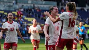 Canada defender Vanessa Gilles (14) celebrates her goal with forward Janine Sonis (16) during the first half of a SheBelieves Cup women's soccer tournament match against Colombia, Sunday, March 1, 2026, in Nashville, Tenn. (George Walker IV/AP)