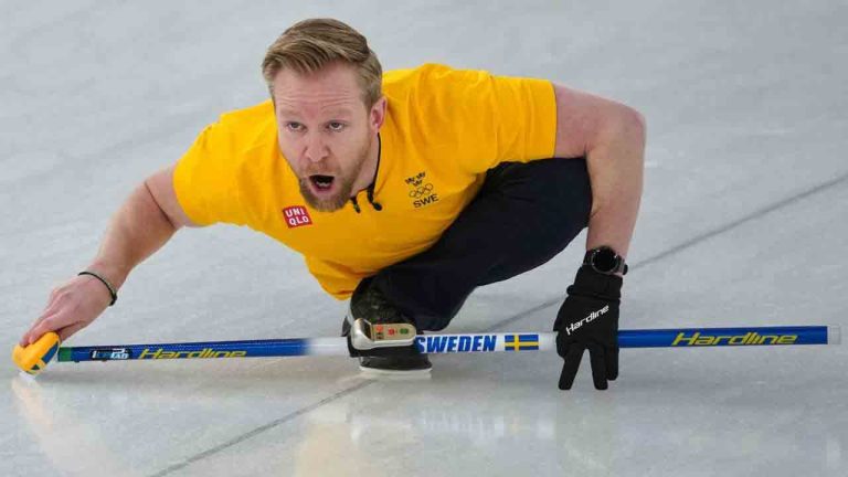 Sweden's Niklas Edin in action during the men's curling round robin session against Switzerland, at the 2026 Winter Olympics, in Cortina d'Ampezzo, Italy, Tuesday, Feb. 17, 2026. (Misper Apawu/AP)
