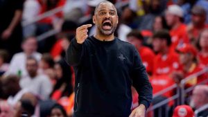 Houston Rockets head coach Ime Udoka yells from the bench to players during the first half of Game 3 in a first-round NBA playoffs basketball series against the Los Angeles Lakers Friday April 24, 2026, in Houston. (Michael Wyke/AP)