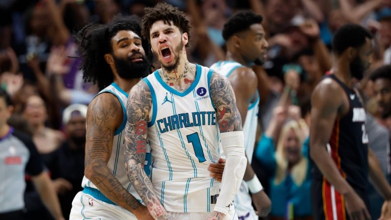 Charlotte Hornets guard LaMelo Ball (1) celebrates with guard Coby White after scoring against the Miami Heat during the second half of an NBA play-in tournament basketball game in Charlotte, N.C., Tuesday, April 14, 2026. (Nell Redmond/AP)