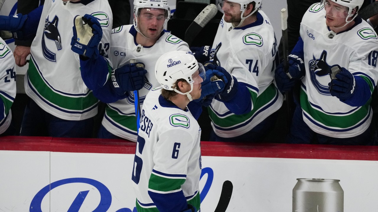 Boeser has hat trick, last-place Canucks overcome blowing four-goal lead to beat NHL-leading Avalanche