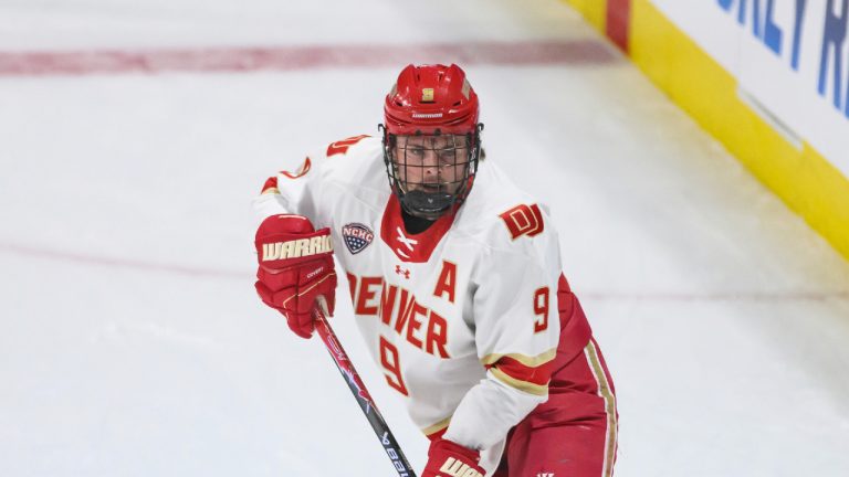 Denver defenceman Boston Buckberger (9) skates during the first period of an NCAA hockey regional game against Cornell, Friday, March 27, 2026, in Loveland, Co. (Tyler Tate/AP)