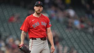 Boston Red Sox starting pitcher Garrett Crochet (35) stands in the mound as Minnesota Twins' Ryan Kreidler (5) runs the bases after hitting a solo home run during the second inning of a baseball game Monday, April 13, 2026, in Minneapolis. (Abbie Parr/AP)