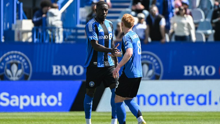 CF Montreal's Prince Owusu, left, celebrates with teammate Matty Longstaff (8) after scoring against New York City FC during first half MLS soccer action in Montreal, Saturday, April 25, 2026. (Graham Hughes/CP)