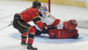 Florida Panthers goaltender Sergei Bobrovsky (72) makes a glove save on Ottawa Senators centre Tim StÃtzle (18) during second period NHL action in Ottawa on Thursday, April 9, 2026. (Adrian Wyld/CP)