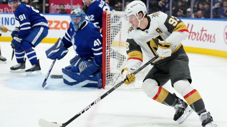 Vegas Golden Knights' Mitch Marner (93) tries a wrap around on Toronto Maple Leafs goaltender Anthony Stolarz (41) during third period NHL hockey action in Toronto on Friday, January 23, 2026. THE CANADIAN PRESS/Nathan Denette
