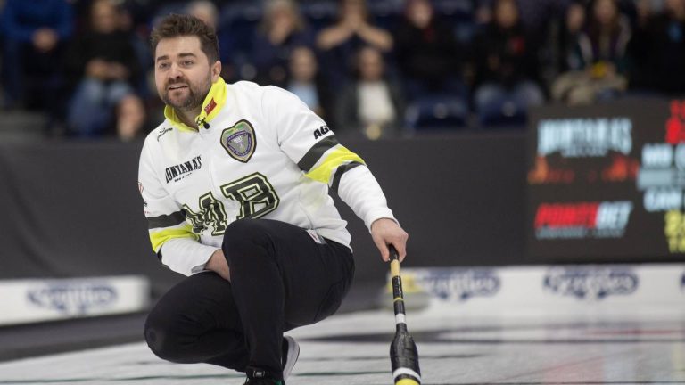 Matt Dunstone, skip of Team Manitoba-Dunstone, watches his last stone of the 10th End during the semifinal against Team Canada at the Montana's Brier Canadian men's curling championship, in St. John's, N.L., on Sunday, March 8, 2026. THE CANADIAN PRESS/Paul Daly