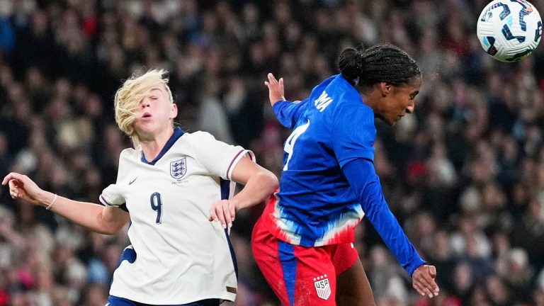 England's Alessia Russo and United States' Naomi Girma challenge for the ball during the International friendly women's soccer match between England and United States at Wembley stadium in London, Nov. 30, 2024. (Kirsty Wigglesworth/AP)