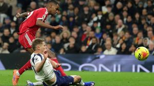 Liverpool's Alexander Isak, top, scores the opening goal during the English Premier League soccer match between Tottenham and Liverpool in London, Dec. 20, 2025. (Ian Walton,/AP)