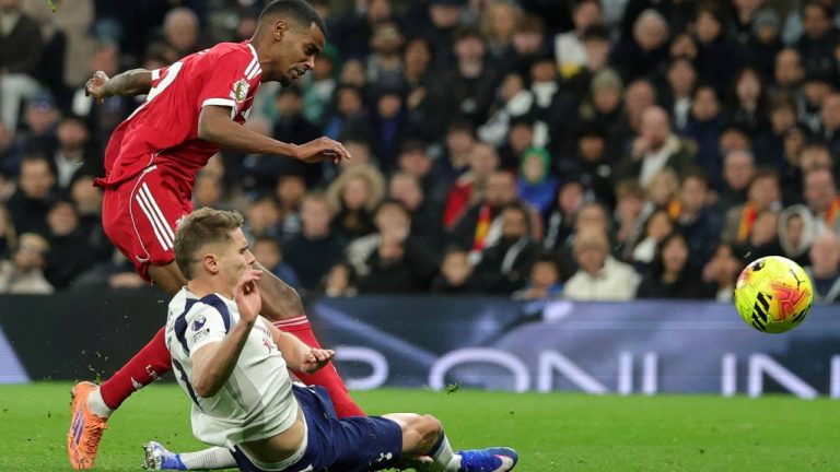 Liverpool's Alexander Isak, top, scores the opening goal during the English Premier League soccer match between Tottenham and Liverpool in London, Dec. 20, 2025. (Ian Walton,/AP)